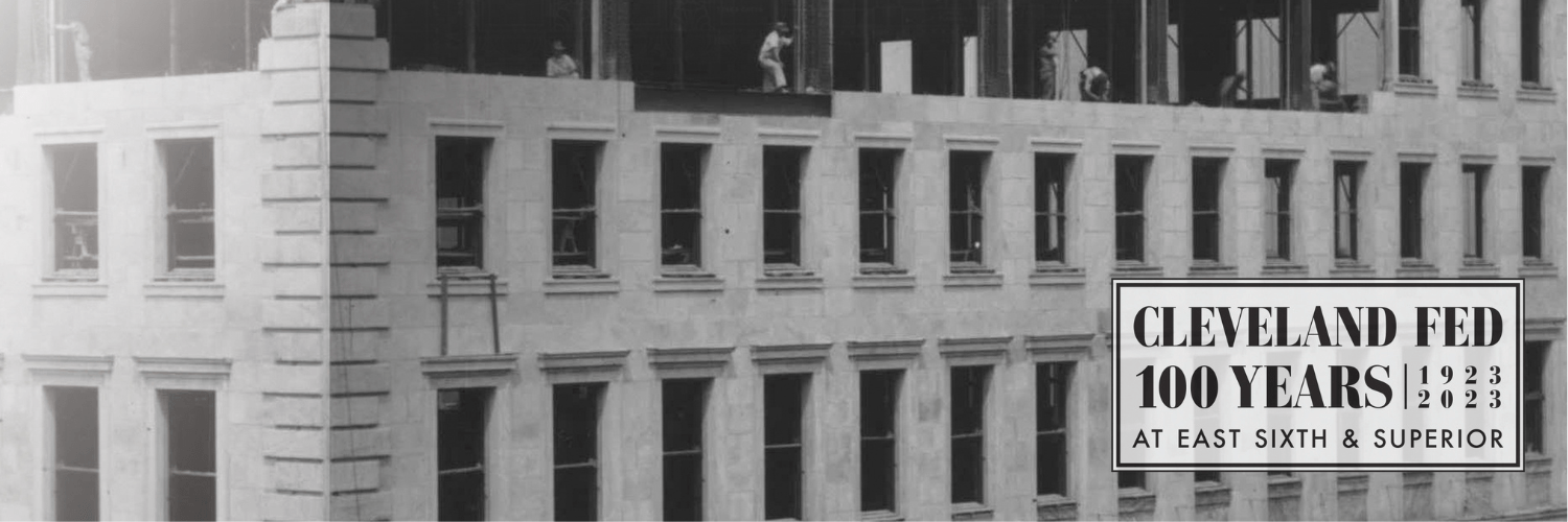 The text "Cleveland Fed: 100 Years at East Sixth & Superior (1923-2023)" over an image of the Federal Reserve Bank of Cleveland.