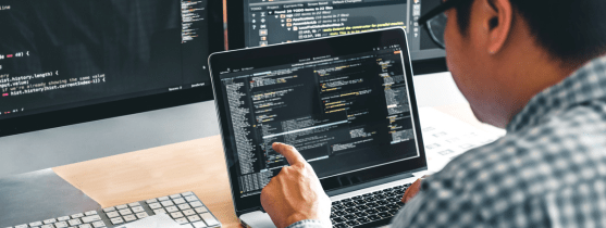 A person working on a laptop.