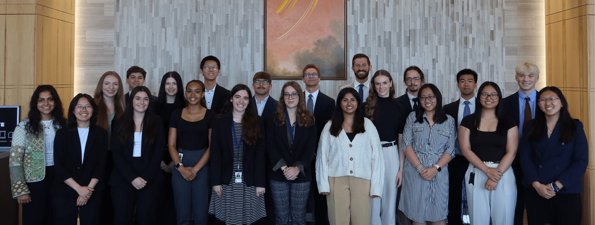 A group of interns in a conference room.