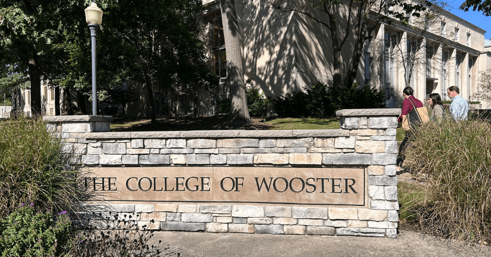 President Hammack walks through the College of Wooster campus with college officials. (October 4, 2024)