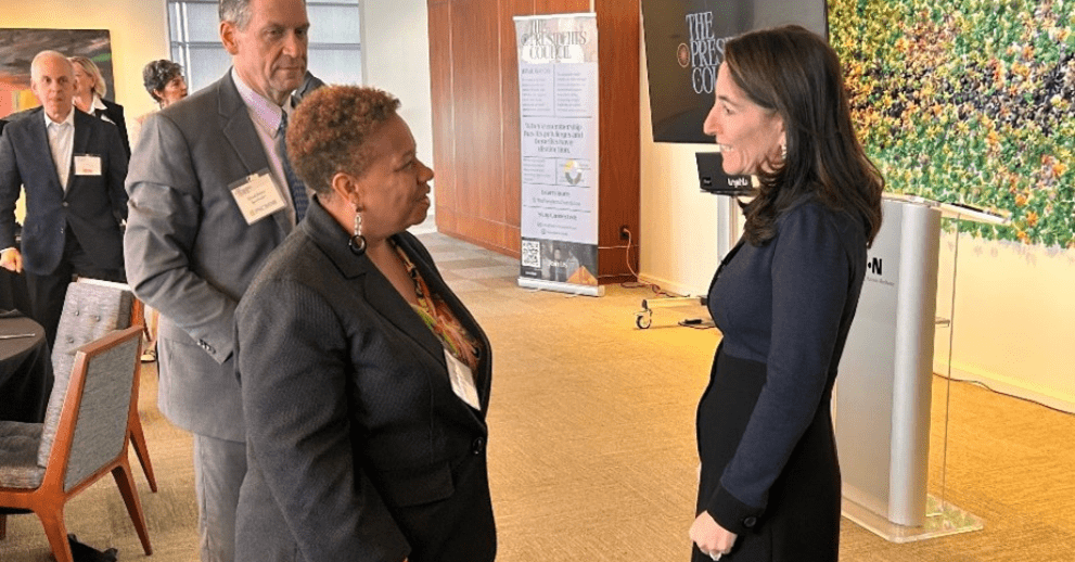 Hammack chats with meeting attendees following the discussion (December 3, 2024)