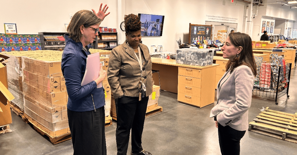 Hammack listens to GCFB CEO Kristin Warzocha explain the demand for Shoes and Clothes for Kids (December 4, 2024)