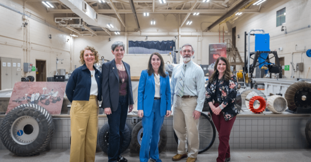 Dr. Phil Abel (second from right) of NASA’s Glenn Research Center and members of the Cleveland Fed visit the center’s Simulated Lunar Operations (SLOP) Laboratory, which is used to evaluate the performance of vehicles on simulated lunar and Martian terrain under controlled test conditions.
