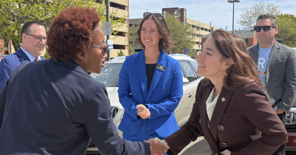 Beth Hammack greets Cathryn Easterling, director of Erie’s Department of Neighborhood and Economic Development. Also pictured, from left to right, are Russell Mills from the Cleveland Fed, Colleen Dougherty from the Erie Regional Chamber and Growth Partnership, and Drew Whiting from the Erie Downtown Development Corp.