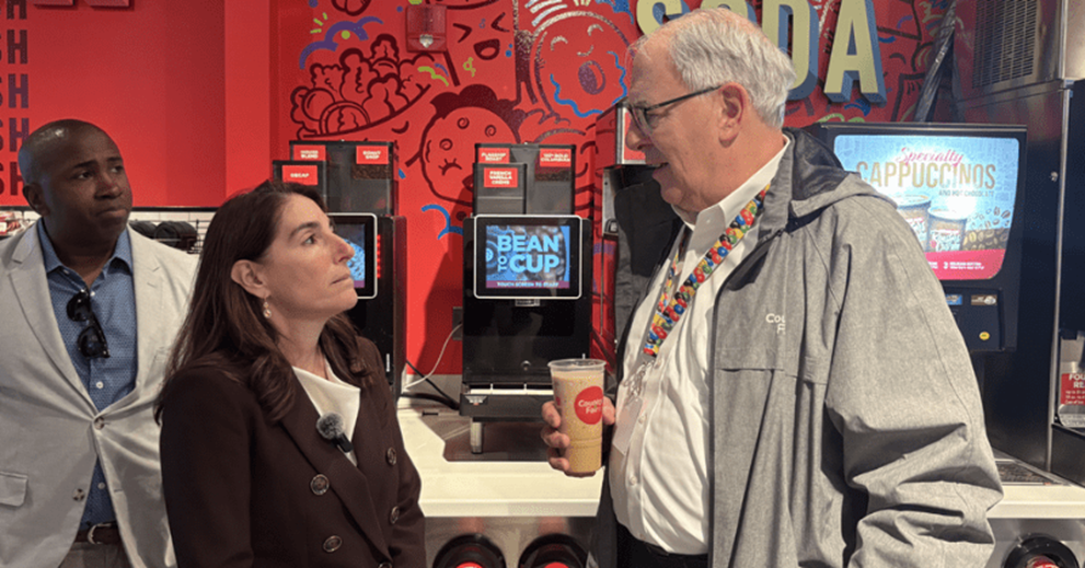 Hammack talks to Paul Rankin, vice president of retail marketing at Country Fair, while visiting the convenience store chain’s flagship store in downtown Erie. Also pictured is Brandon Mendoza, president and CEO of the Erie Regional Chamber and Growth Partnership.