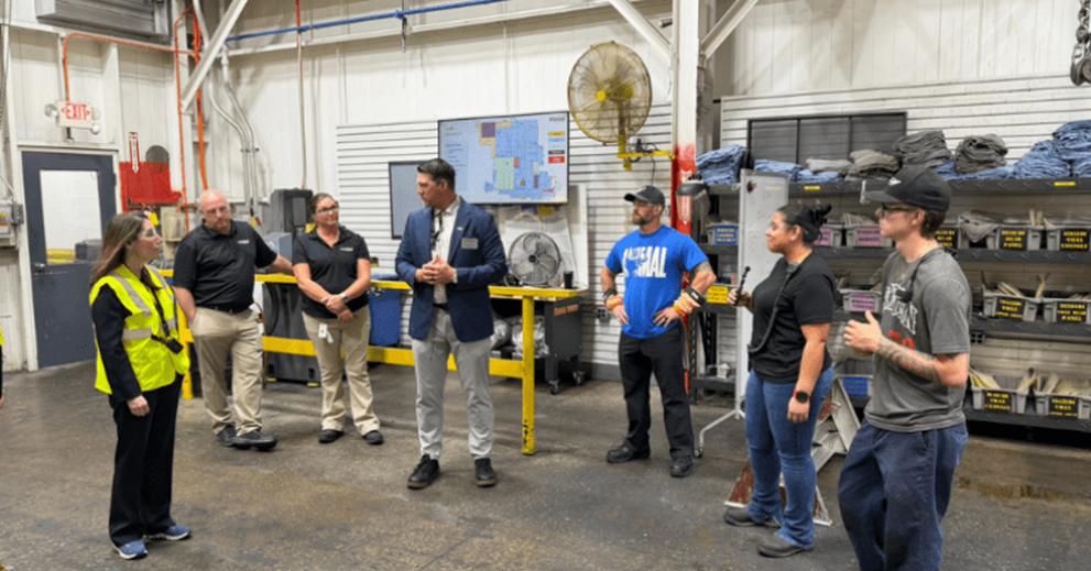 Beth Hammack chats with Whirlpool leaders and employees.