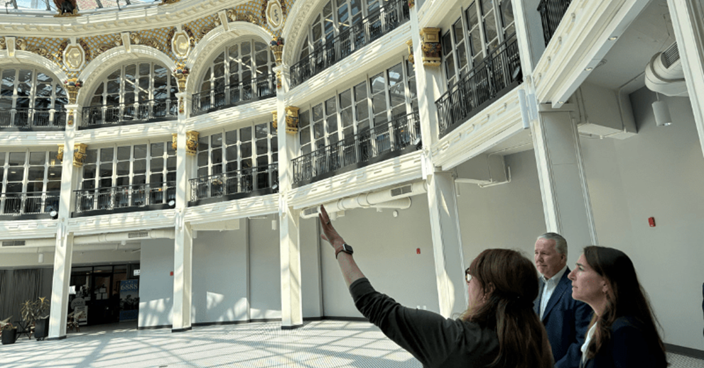Hammack tours the Dayton Arcade with Mindi Wardell of Cross Street Partners (left) and Dan Kane of CityWide Development Corporation (middle).