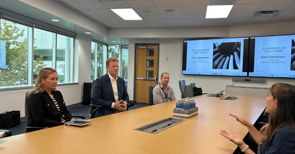Hammack (right), meets with GE Aerospace leaders Shannon Mann (left), Pete Giambastiani (center left), and Michael Stransky (center right).
