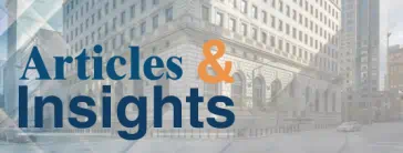 The text "Articles & Insights" over an image of the Federal Reserve Bank of Cleveland building.