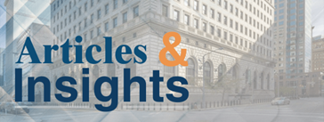 The text "Articles & Insights" over an image of the Federal Reserve Bank of Cleveland building.