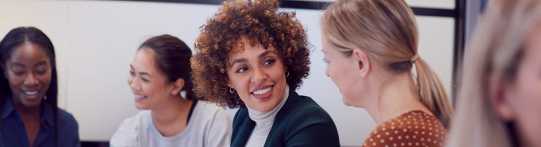 Group of diverse women at work