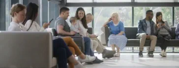 People sitting in a waiting room.