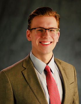 Headshot of Alexander Cline